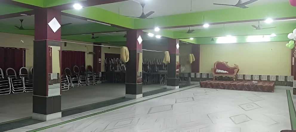 Full banquet hall interior view showing seating arrangement at ARATI KUNJA